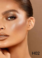 Cream highlighter shade H02 on model cheekbones | SIX BEAUTY