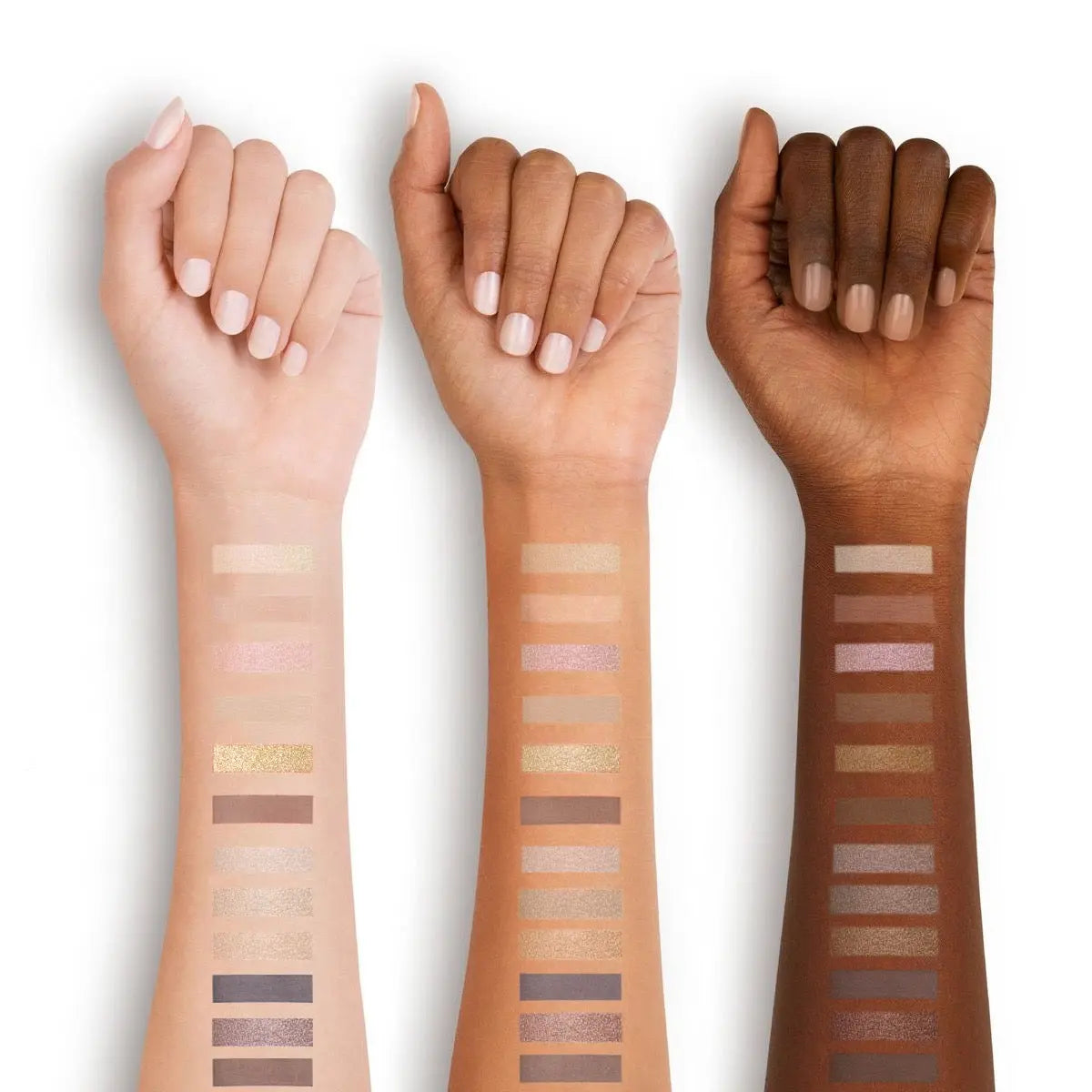 Gold eyeshadow palette swatched across three skin tones 