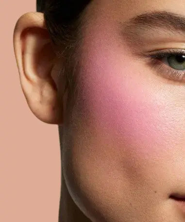 Hot pink powder blush swatch on white background | SIX BEAUTY