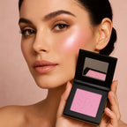 Model holding cream highlighter with pink glow | SIX BEAUTY