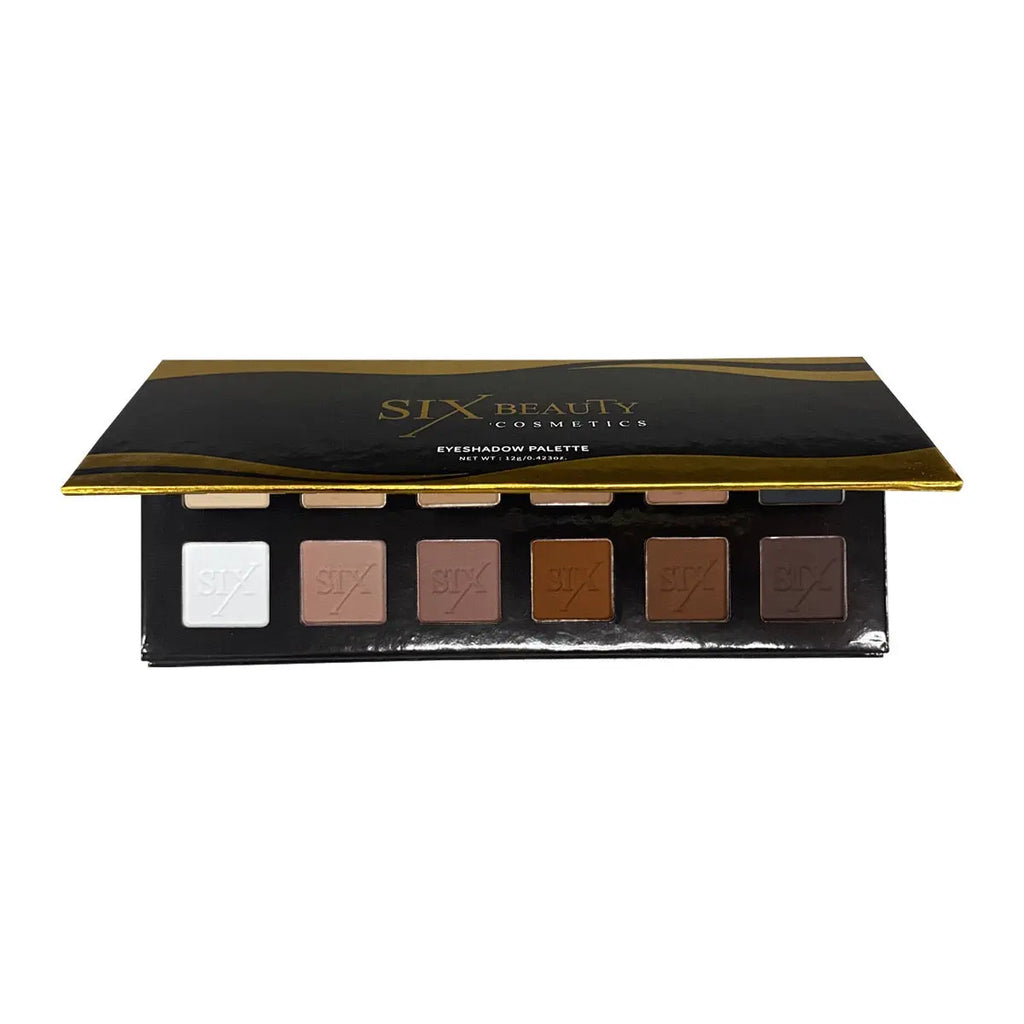 Nude eyeshadow palette open showing 12 skin-tone shades | SIX BEAUTY