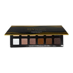 Nude eyeshadow palette open showing 12 skin-tone shades | SIX BEAUTY